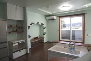 グリーンの塗り壁とブリックタイル仕上げ
塗り壁材には調湿･消臭･断熱効果が含まれています。